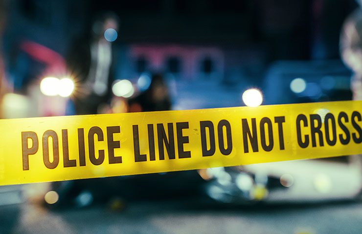 police tape blocking a crime scene during Biohazard and Crime Scene Cleaning Solutions in Garland, TX